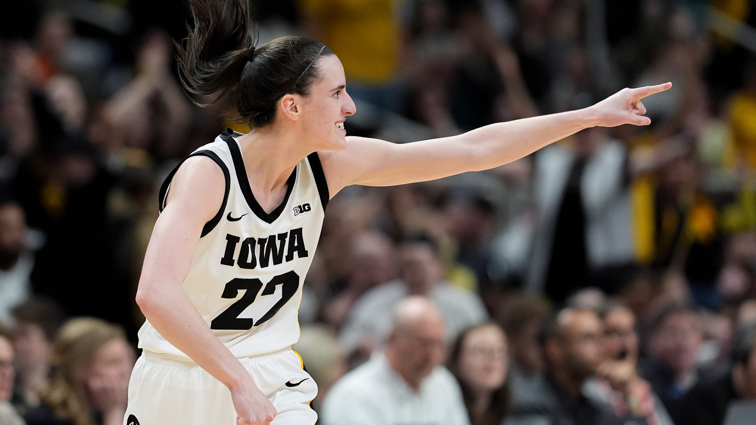 Iowa guard Caitlin Clark (22) reacts after hitting a three-point shot against LSU during the third quarter of an Elite Eight round college basketball game during the NCAA Tournament, Monday, April 1, 2024, in Albany, N.Y. (AP Photo/Mary Altaffer)