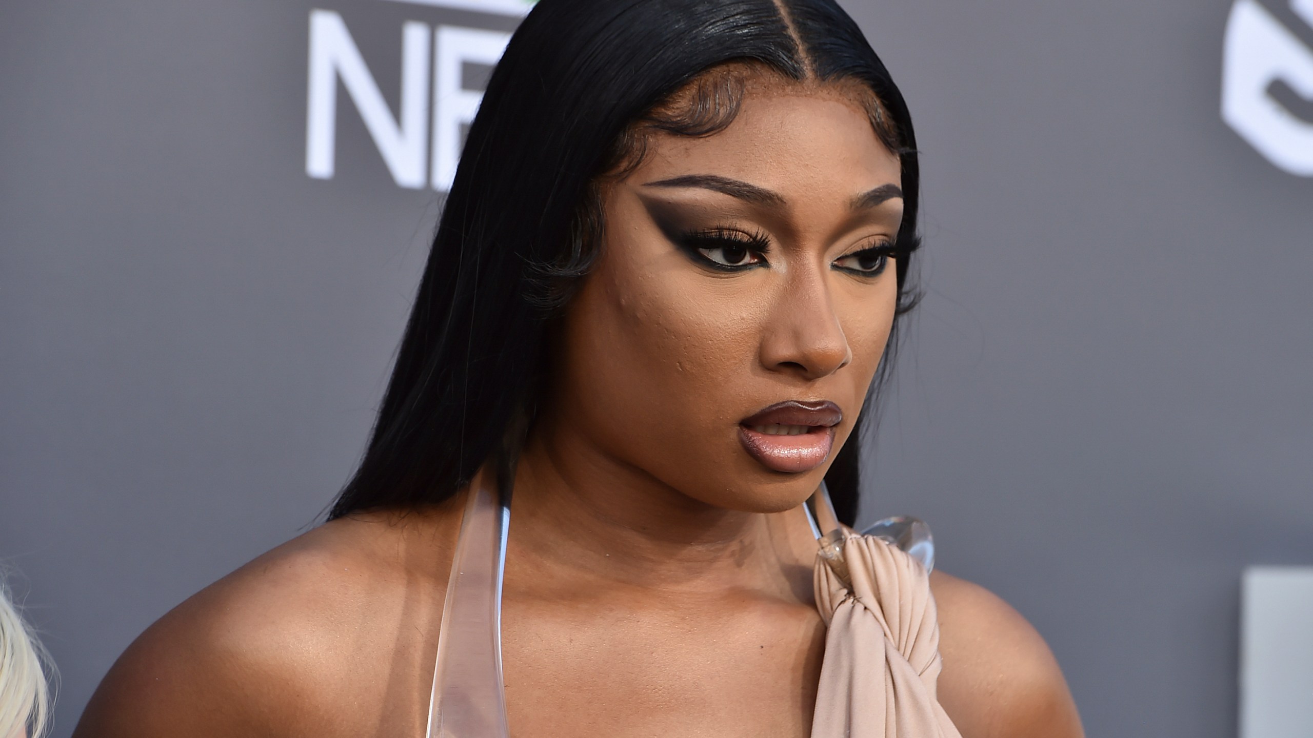 FILE - Megan Thee Stallion arrives at the Billboard Music Awards at the MGM Grand Garden Arena, May 15, 2022, in Las Vegas. A photographer who worked for the hip-hop star said in a lawsuit filed Tuesday, April 23, 2024, that he was forced to watch her have sex, was unfairly fired soon after and was abused as her employee. (Photo by Jordan Strauss/Invision/AP, File)