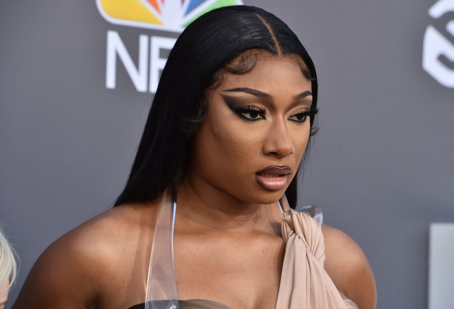 FILE - Megan Thee Stallion arrives at the Billboard Music Awards at the MGM Grand Garden Arena, May 15, 2022, in Las Vegas. A photographer who worked for the hip-hop star said in a lawsuit filed Tuesday, April 23, 2024, that he was forced to watch her have sex, was unfairly fired soon after and was abused as her employee. (Photo by Jordan Strauss/Invision/AP, File)