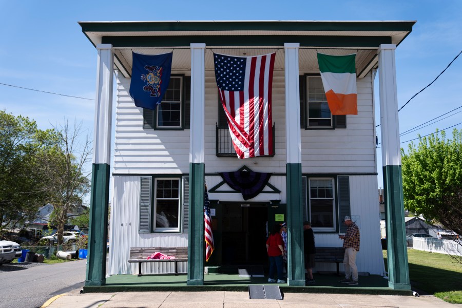 Workers wait for voters at a polling place of in Bristol, Pa., Tuesday, April 23, 2024. (AP Photo/Matt Rourke)