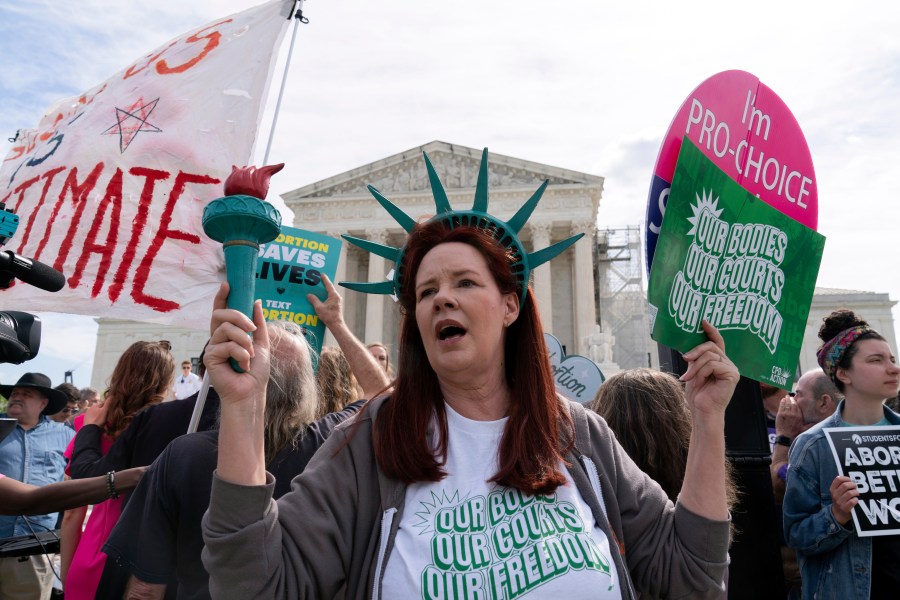 Abortion-rights activists rally outside the Supreme Court, Wednesday, April 24, 2024, in Washington. (AP Photo/Jose Luis Magana)