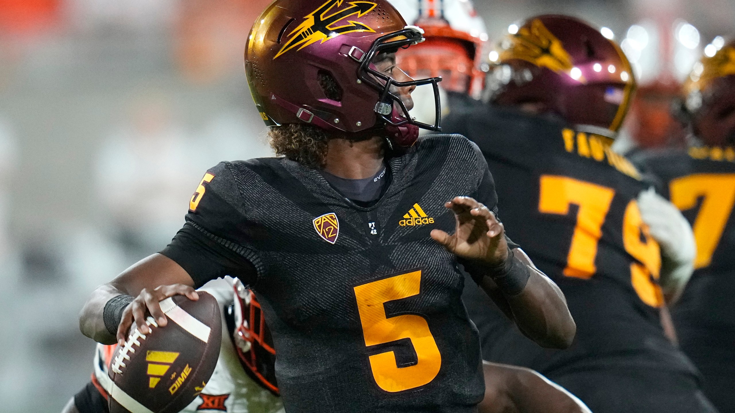 FILE - Arizona State quarterback Jaden Rashada throws a pass against Oklahoma State during the second half of an NCAA college football game Saturday, Sept. 9, 2023, in Tempe, Ariz. Rashada has committed to Georgia and is back in the Southeastern Conference after the one-time Florida commit's NIL deal fell apart. (AP Photo/Ross D. Franklin, File)