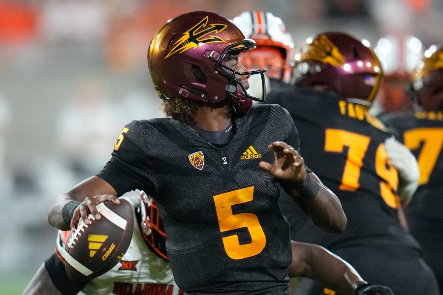 FILE - Arizona State quarterback Jaden Rashada throws a pass against Oklahoma State during the second half of an NCAA college football game Saturday, Sept. 9, 2023, in Tempe, Ariz. Rashada has committed to Georgia and is back in the Southeastern Conference after the one-time Florida commit's NIL deal fell apart. (AP Photo/Ross D. Franklin, File)