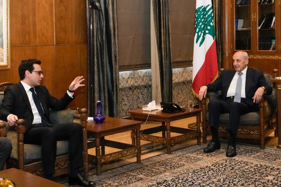 French Foreign Minister Stephane Sejourne, left, speaks with Parliament Speaker Nabih Berri during their meeting in Beirut, Lebanon, Sunday, April 28, 2024. (AP Photo/Hassan Ammar)