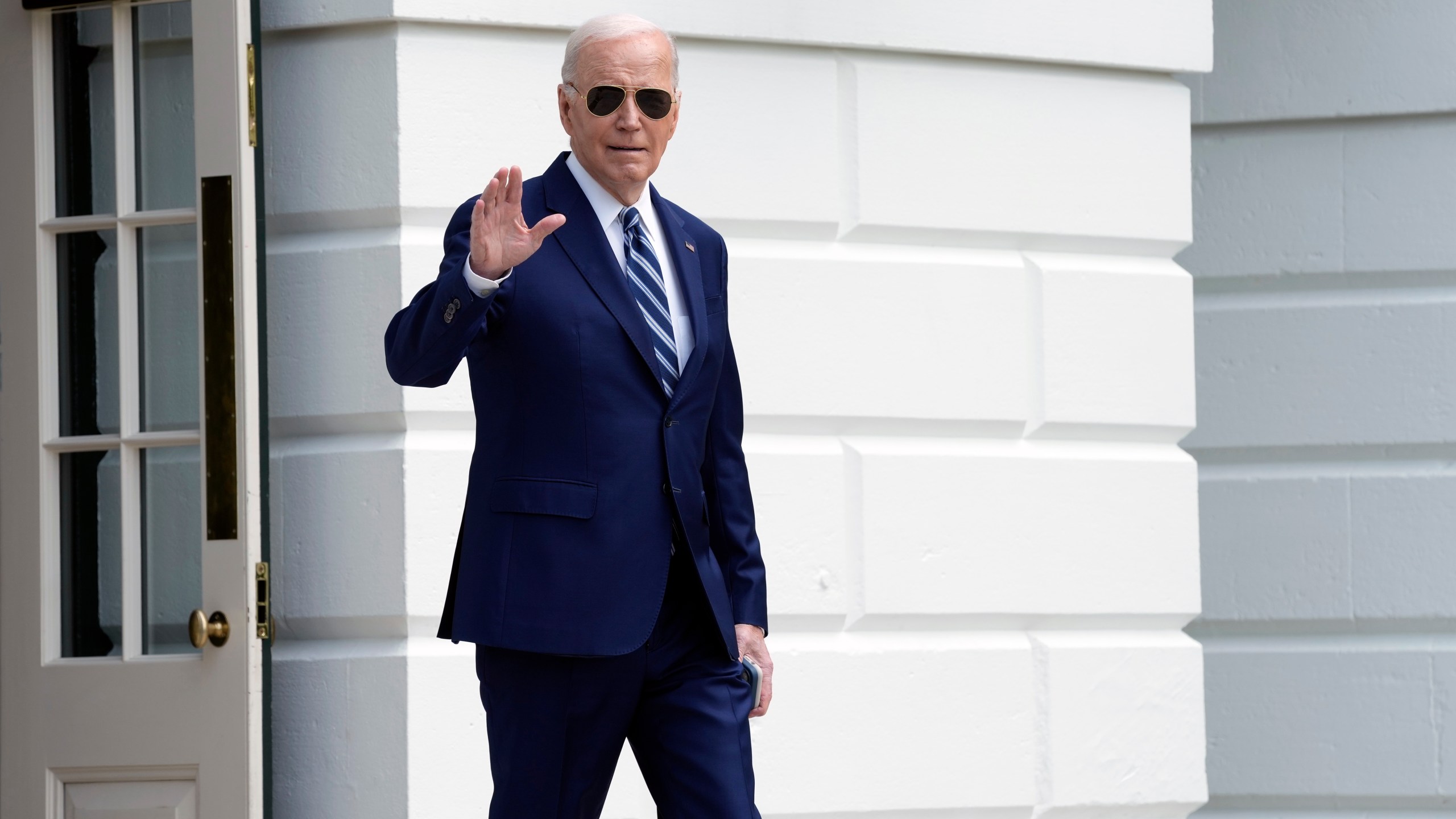 President Joe Biden waves as he walks out of the White House in Washington, Thursday, April 25, 2024, before departing on a trip to New York. (AP Photo/Susan Walsh)