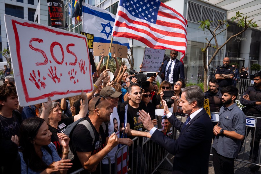 U.S. Secretary of State Antony Blinken speaks to families and supporters of Israeli hostages held by Hamas in Gaza during a protest calling for their return, after meeting families of hostages in Tel Aviv, Israel, Wednesday, May 1, 2024. (AP Photo/Oded Balilty)