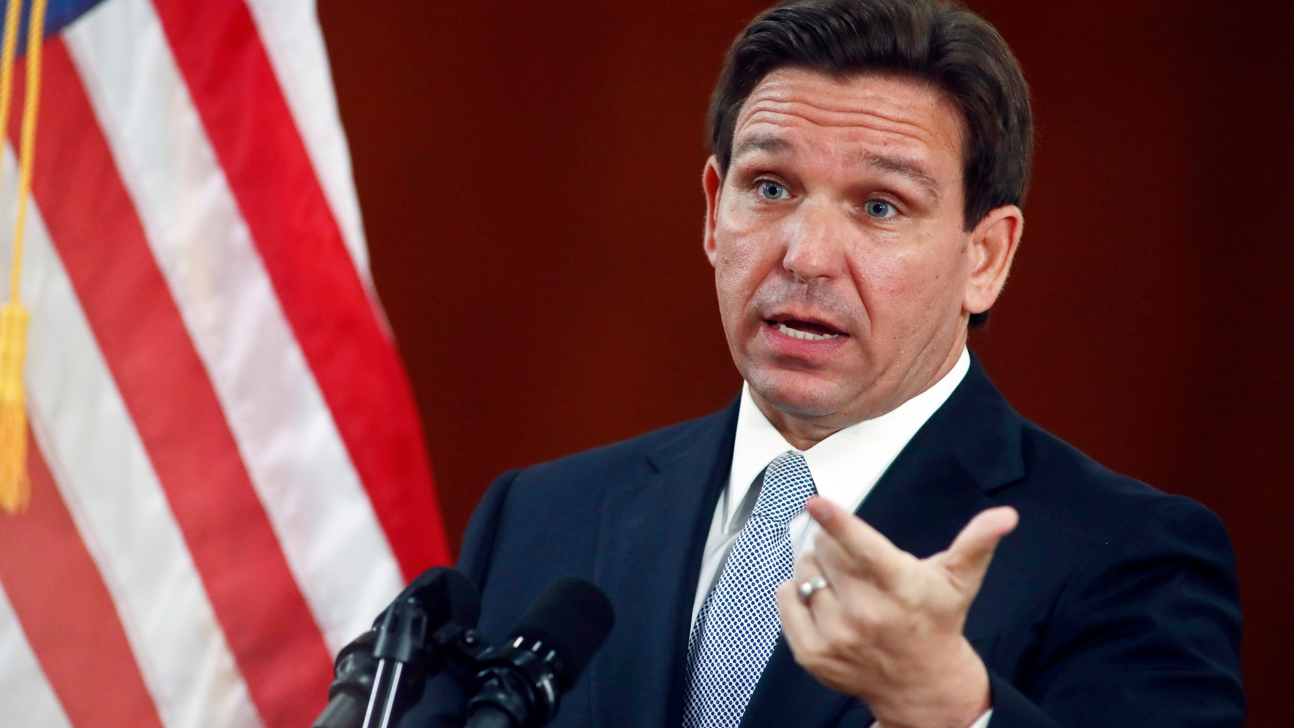 FILE - Florida Gov. Ron DeSantis answers questions from the media, March 7, 2023, at the state Capitol in Tallahassee, Fla. Florida's ban on abortions after six weeks of pregnancy, before many women even know they are pregnant, went into effect Wednesday, May 1, 2024. The Florida Supreme Court, with five of its seven members appointed by DeSantis, ruled 6-1 last month to uphold the state's ban on most abortions after 15 weeks of pregnancy, which cleared the way for the six-week ban. (AP Photo/Phil Sears, File)