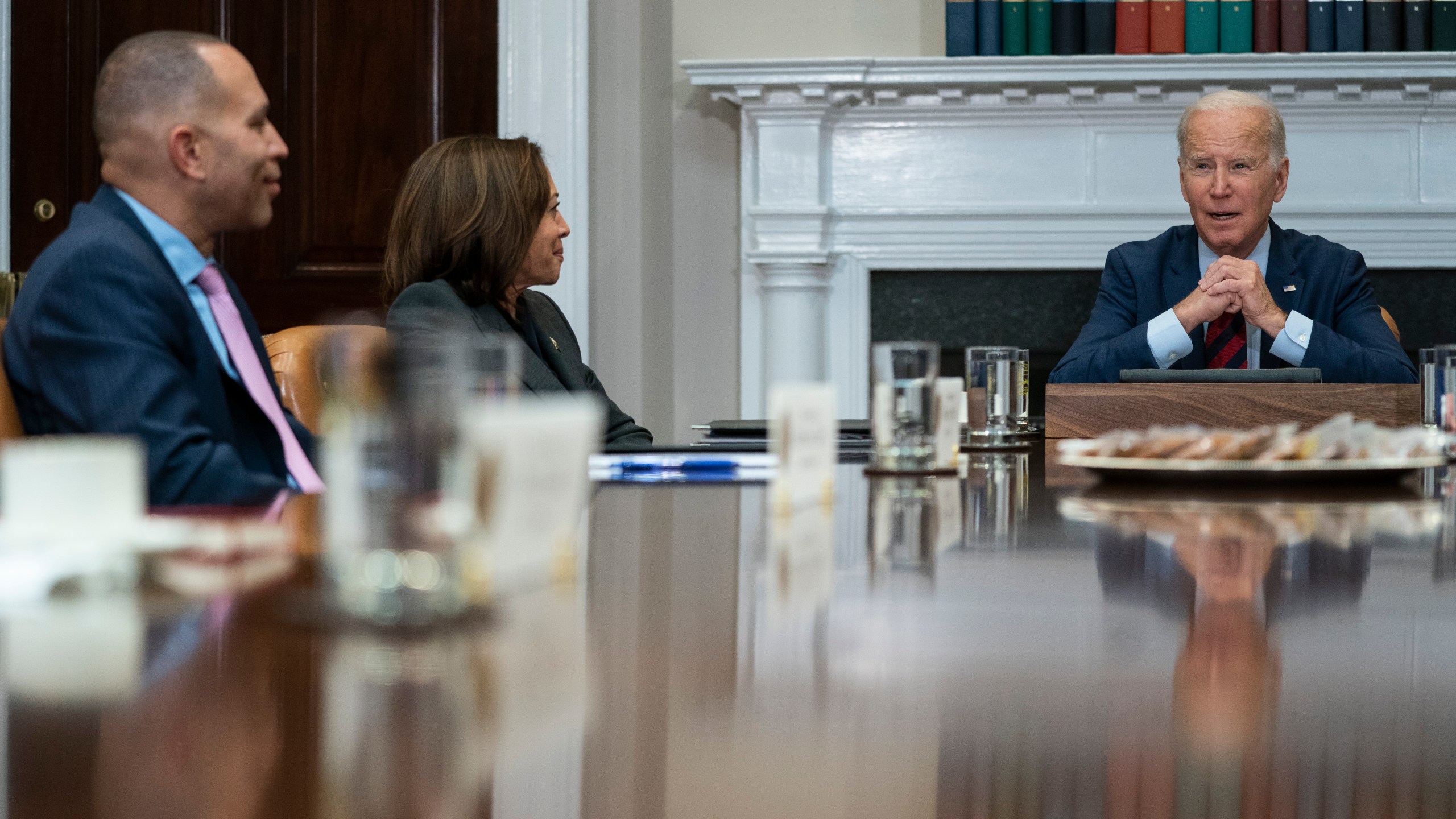 FILE - House Minority Leader Hakeem Jeffries of N.Y., left, and Vice President Kamala Harris listen as President Joe Biden speaks during a meeting with Democratic lawmakers in the Roosevelt Room of the White House, Jan. 24, 2023, in Washington. AP Photo/Evan Vucci, File)