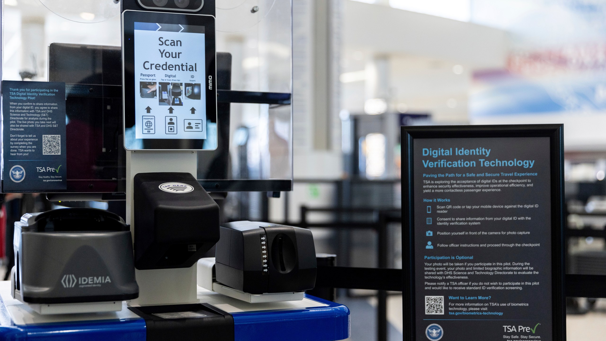 FILE - The Transportation Security Administration's new facial recognition technology is seen at a Baltimore-Washington International Thurgood Marshall Airport security checkpoint, April 26, 2023, in Glen Burnie, Md. A bipartisan group of senators wants restrictions on the use of facial recognition technology by the TSA, saying they're concerned about travelers' privacy and civil liberties.(AP Photo/Julia Nikhinson, File)