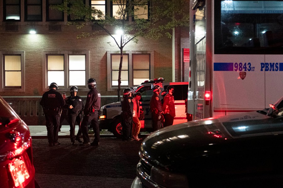 Officers with the New York Police Department stand outside Columbia University's Hamilton Hall as they disperse Pro-Palestine students and protestors occupying Hamilton Hall on Tuesday evening, April 30, 2024 in New York. Members of the occupation took over Hamilton Hall in the early hours of Tuesday morning. (Seyma Bayram via AP)