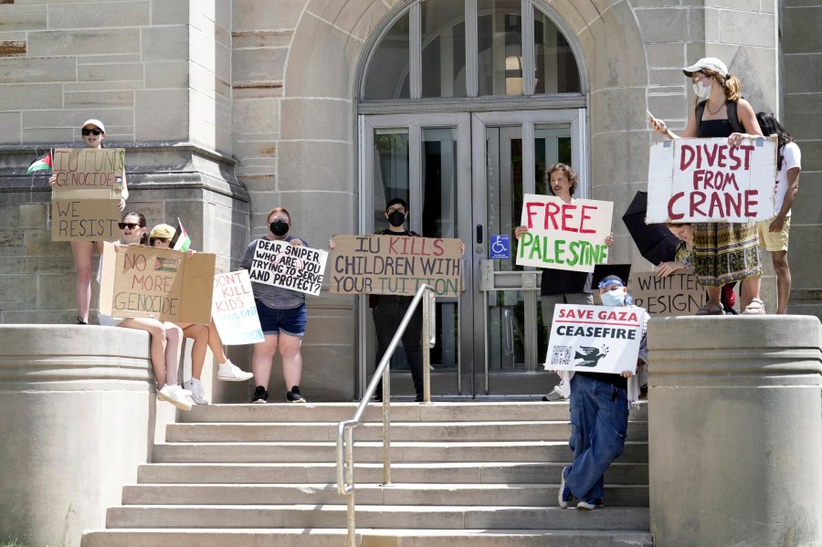 A group of pro-Palestinian protesters demonstrate on the campus of Indiana University in Bloomington, Ind., Thursday, May 2, 2024. (AP Photo/AJ Mast)