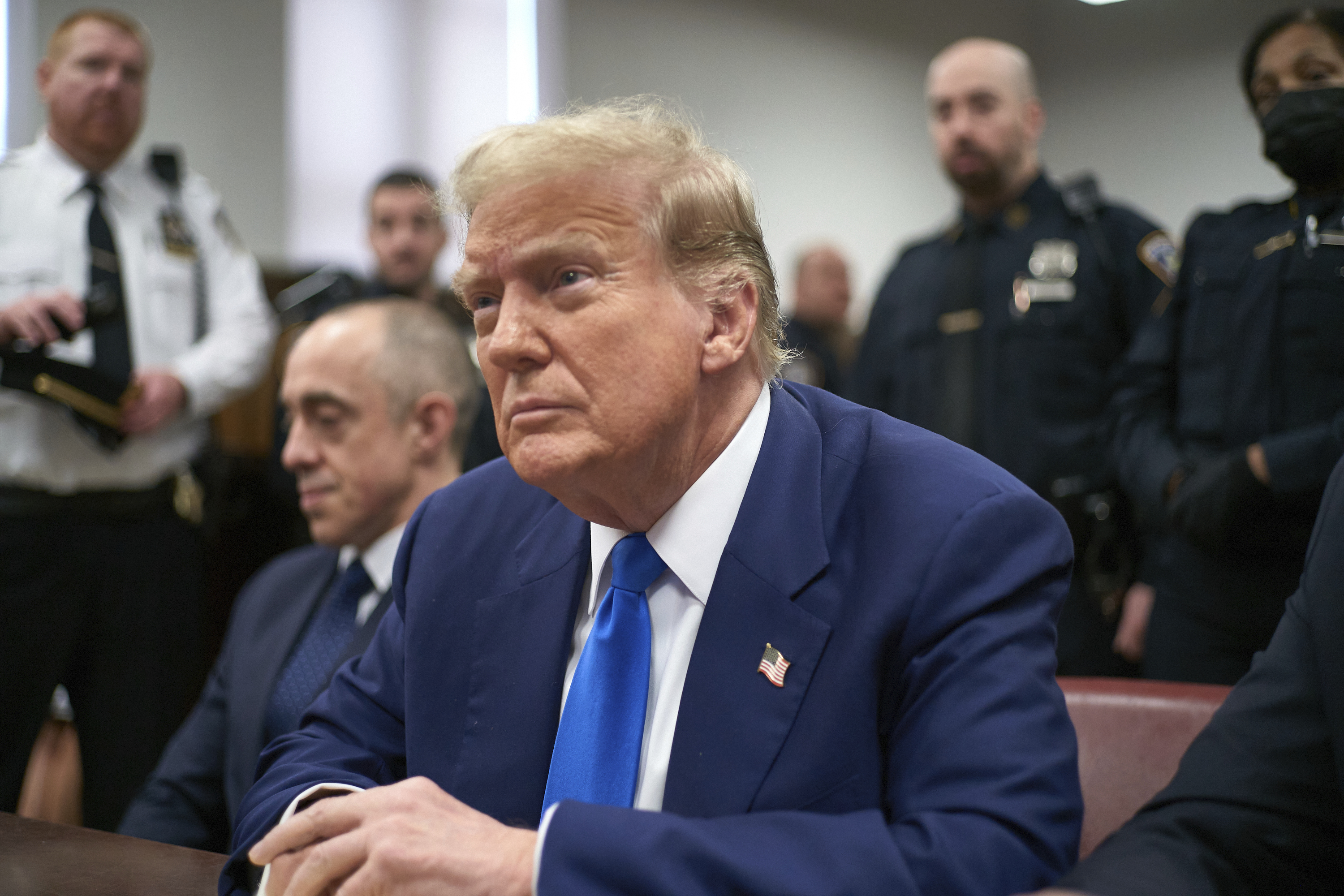 FILE - Former President Donald Trump appears at Manhattan criminal court before his trial in New York, May 3, 2024. Just six months before Election Day, President Joe Biden and Trump are locked into the first presidential rematch in 68 years that is at once deeply entrenched and highly in flux. Trump is in the midst of the first of potentially four criminal trials and could well be a convicted felon by November. Still, nothing prevents him from assuming the presidency if convicted, or even if he is in prison. (Curtis Means/Pool Photo via AP, File)