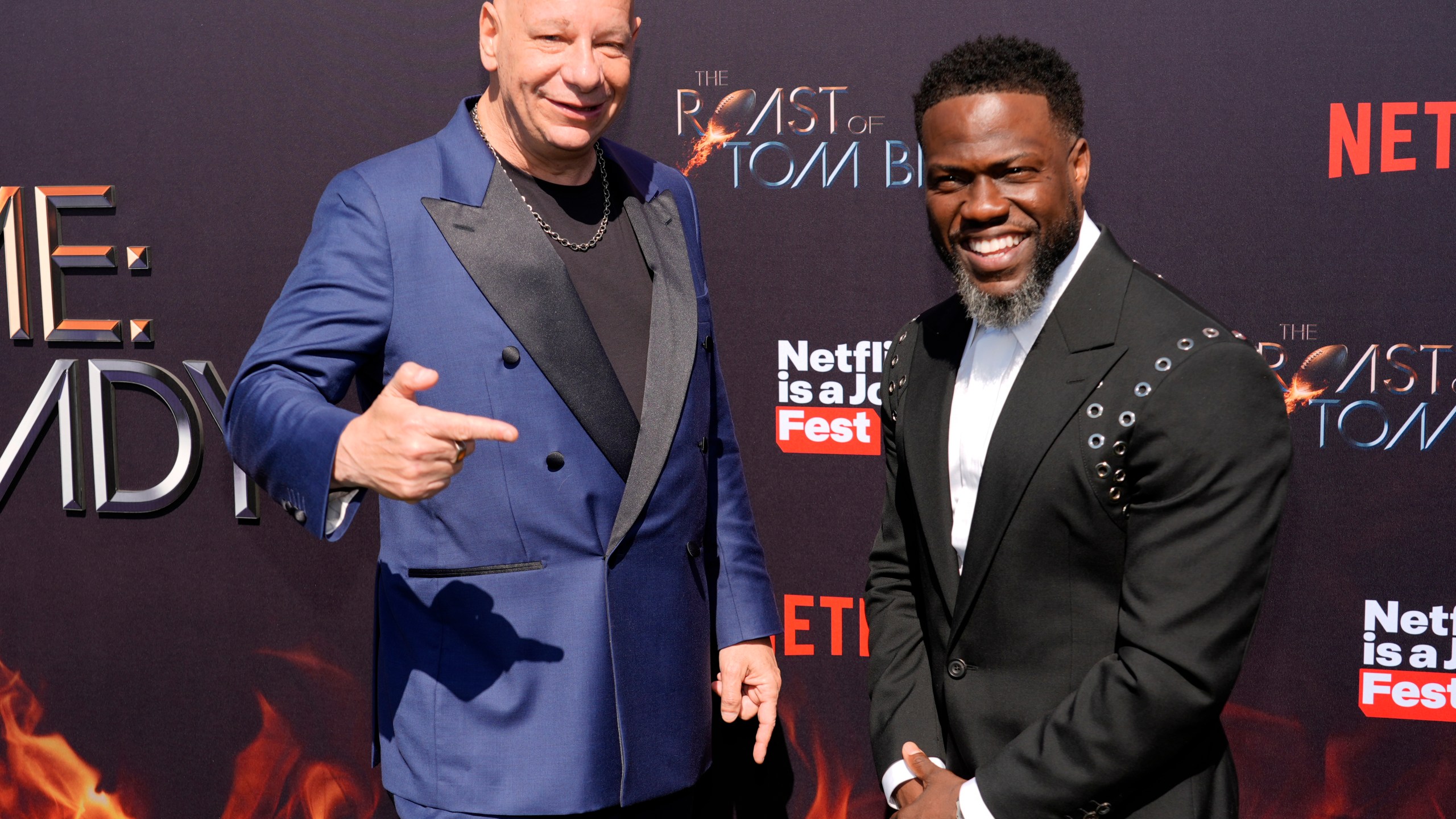 Comedian Jeff Ross, left, and host Kevin Hart pose together at "The Greatest Roast of All Time: Tom Brady" at the Kia Forum, Sunday, May 5, 2024, in Inglewood, Calif. (AP Photo/Chris Pizzello)