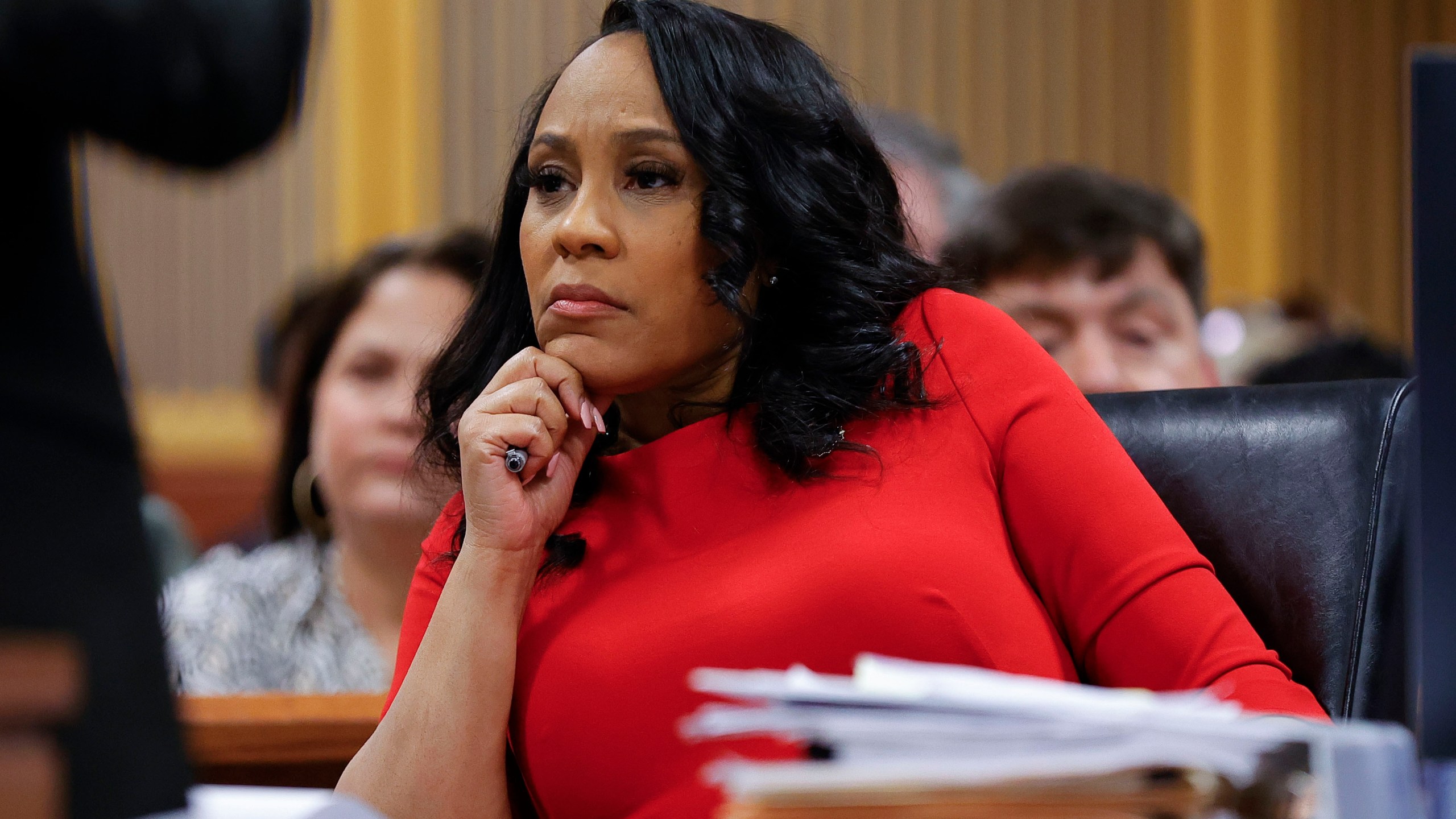 FILE - Fulton County District Attorney Fani Willis looks on during a hearing on the Georgia election interference case, March, 1, 2024, in Atlanta. A Georgia appeals court has agreed to review a lower court ruling allowing Fani Willis to continue to prosecute the election interference case she brought against Donald Trump. (AP Photo/Alex Slitz, Pool)