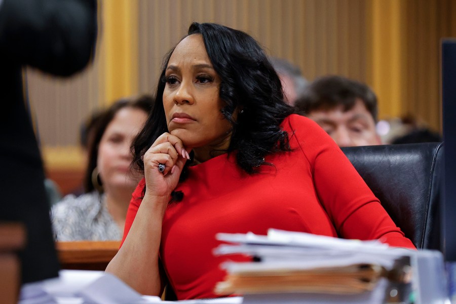 FILE - Fulton County District Attorney Fani Willis looks on during a hearing on the Georgia election interference case, March, 1, 2024, in Atlanta. A Georgia appeals court has agreed to review a lower court ruling allowing Fani Willis to continue to prosecute the election interference case she brought against Donald Trump. (AP Photo/Alex Slitz, Pool)