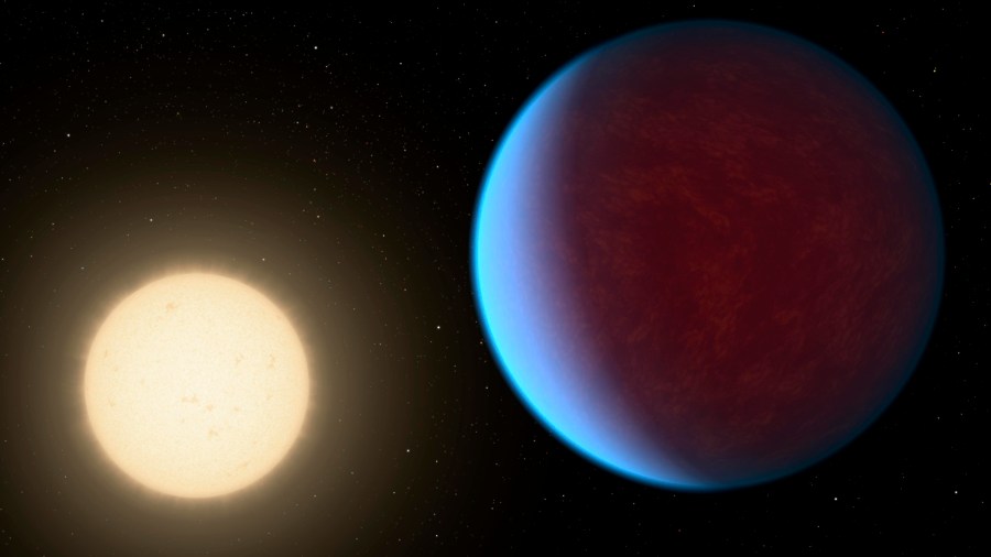 This illustration provided by NASA in 2017 depicts the planet 55 Cancri e, right, orbiting its star. A thick atmosphere has been detected around the planet that’s twice as big as Earth in a solar system about 41 light years away, researchers reported Wednesday, May 8, 2024. (NASA/JPL-Caltech via AP)