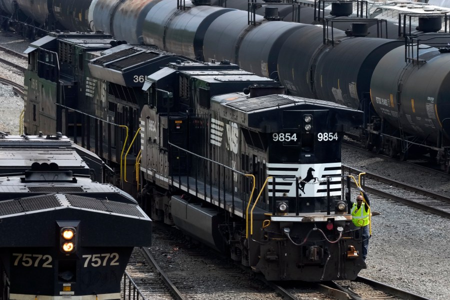 FILE - Norfolk Southern locomotives are moved through the Conway Terminal in Conway, Pa., June 17, 2023. Norfolk Southern shareholders will decide Thursday, May 9, 2024, whether to back an activist investor’s bid to take over the railroad’s board and replace management. (AP Photo/Gene J. Puskar, File)