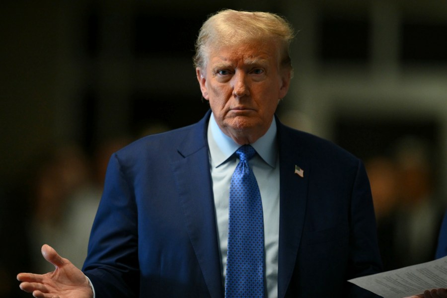 Former President Donald Trump speaks to reporters at Manhattan Criminal Court in New York, Thursday, May 9, 2024. (Angela Weiss/Pool Photo via AP)