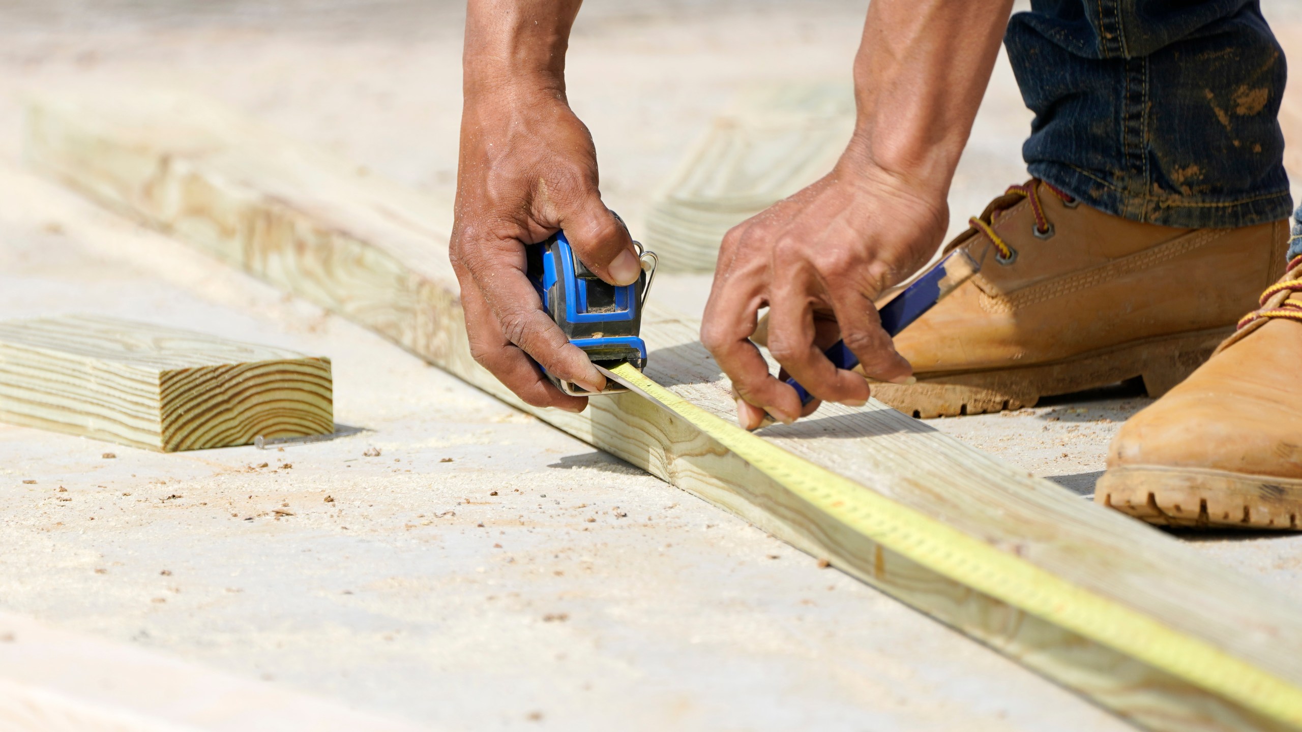 FILE - A beam is measured and marked at a housing site in Madison County, Miss., Tuesday, March 16, 2021. Homeowners have been spending more for renovations in recent years, as high interest rates and inflation drove up costs for everything from flooring to refrigerators. (AP Photo/Rogelio V. Solis, File)