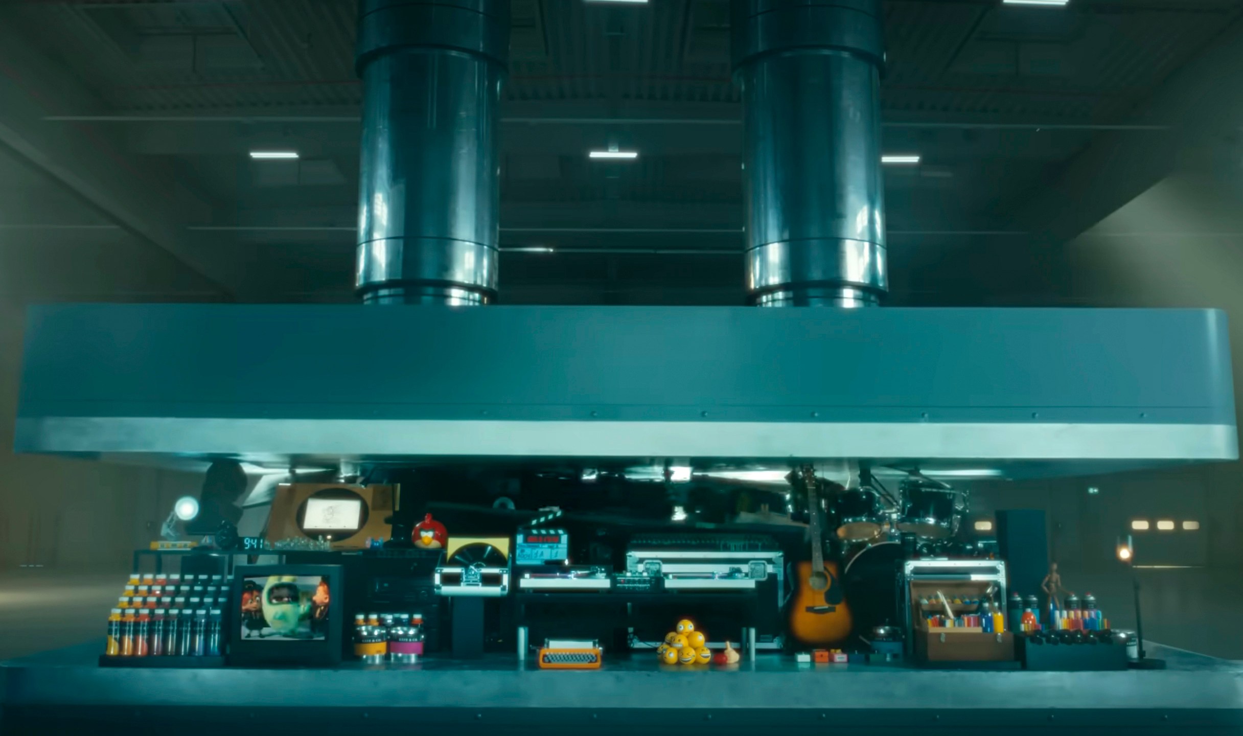 In this image taken from a video advertisement, a hydraulic press crushes an array of creative instruments .The newly-released ad promoting Apple's new iPad Pro has struck quite a nerve online. (Apple via AP)