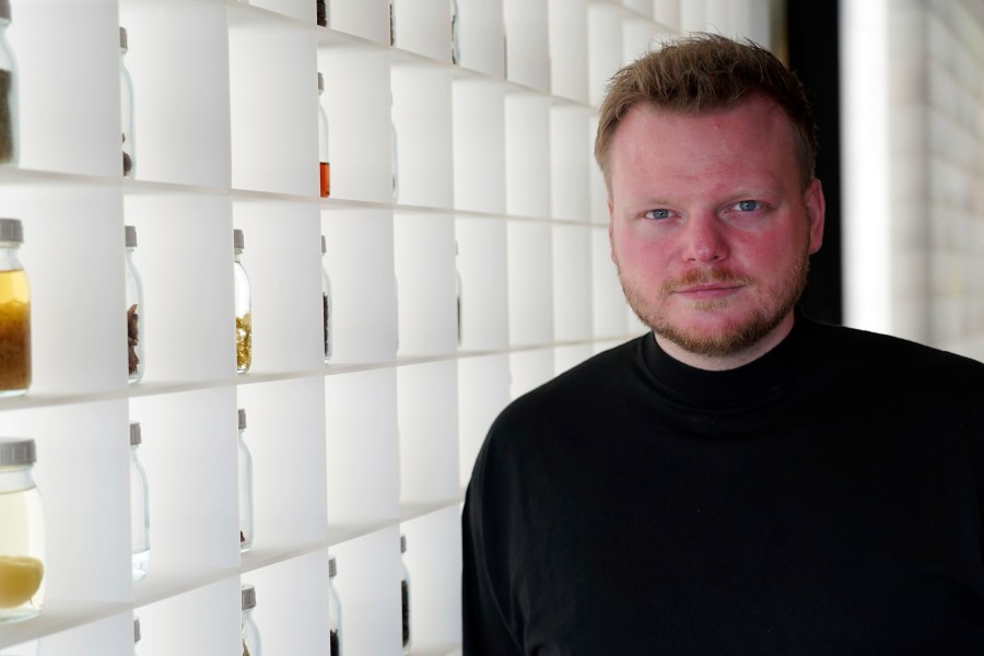 Rasmus Munk, co-owner and chef of Alchemist restaurant, poses inside Alchemist’s kitchen, in Copenhagen, Denmark, Monday May 6, 2024. The Danish Michelin-starred chef has teamed up with the Florida-based startup Space Perspective to take fine-dining to our upper atmosphere in late 2025. Six guests are set to ascend to the stratosphere, where they will enjoy an immersive dining experience served up by chef Rasmus Munk. (AP Photo/James Brooks)