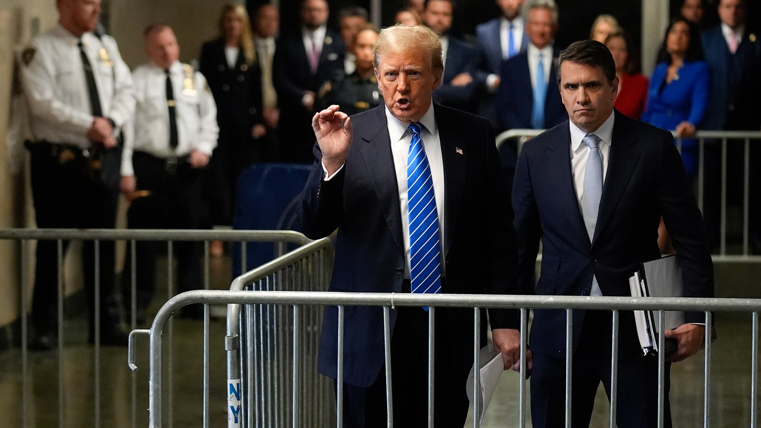 Former President Donald Trump speaks to members of the media upon arriving at Manhattan criminal court, Monday, May 13, 2024, in New York. (AP Photo/Seth Wenig, Pool)