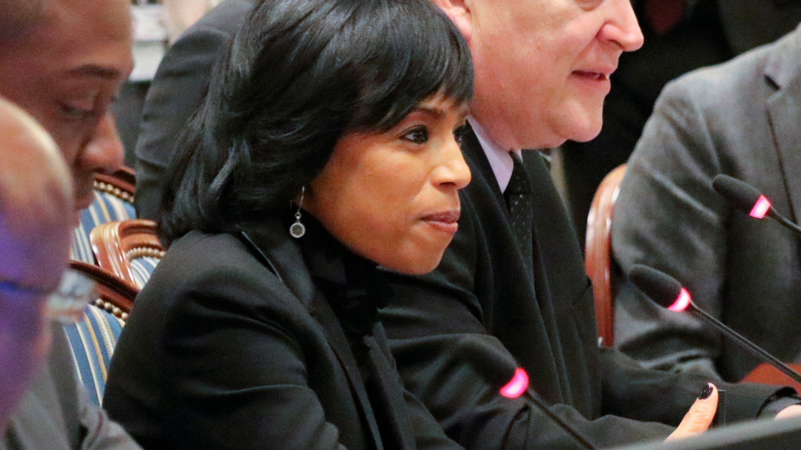 FILE - Prince George's County Executive Angela Alsobrooks, center, listens during a bill hearing in Maryland, Jan. 23, 2020, in Annapolis, Md. Democrats voting in Maryland's contentious primary for U.S. Senate are divided about who is best positioned to beat Republican former Gov. Larry Hogan. Alsobrooks and Congressman David Trone are the most prominent candidates in the Democratic primary. (AP Photo/Brian Witte, File)