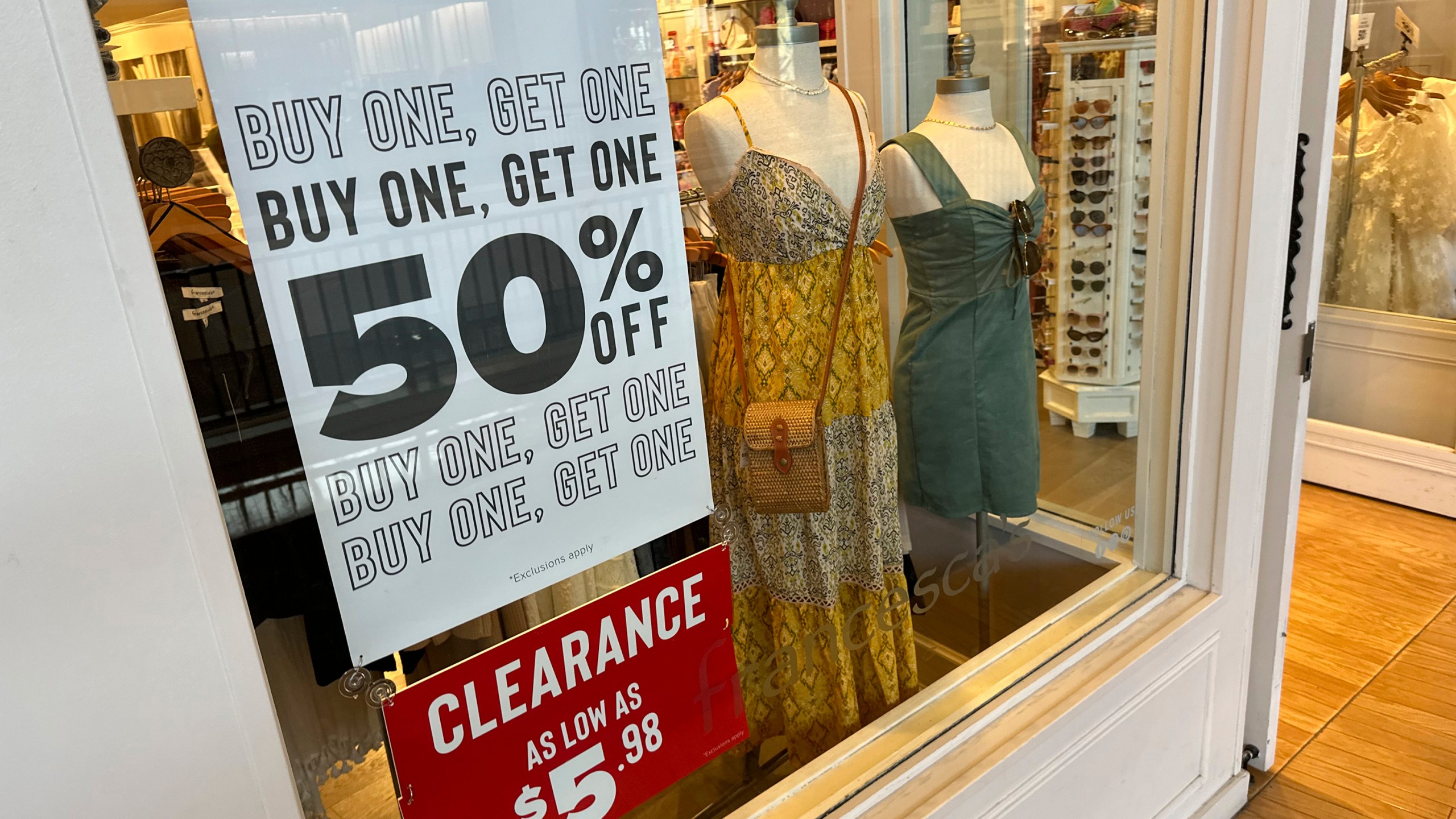 A sign trumpets discounts available in a clothing store in a mall Monday, April 29, 2024, in Lone Tree, Colo. On Wednesday, May 15, 2024, the Labor Department issues its report on inflation at the consumer level in April. (AP Photo/David Zalubowski)