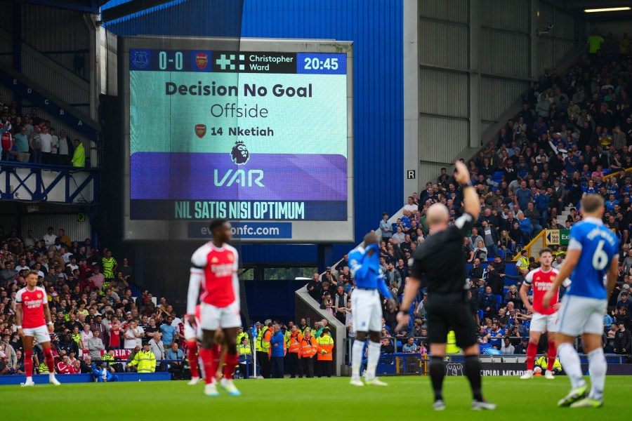 FILE - The display shows the VAR decision on a disallowed goal during the English Premier League soccer match between Everton and Arsenal at the Goodison Park stadium in Liverpool, England, Sept. 17, 2023. In England, according to figures given to rights-holder Sky Sports in February, 82% of refereeing decisions were deemed "correct" by the Premier League before VAR was adopted ahead of the 2019-20 season. Since VAR has been used, 96% of the decisions are correct, according to the league. (AP Photo/Jon Super, File)