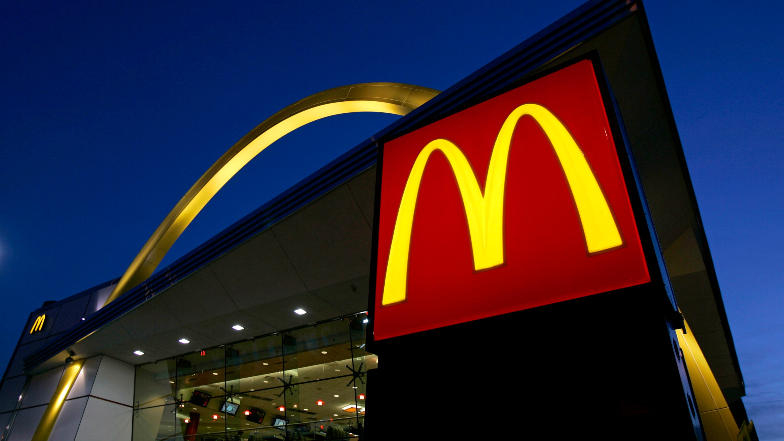 The McDonald's restaurant logo and golden arch.