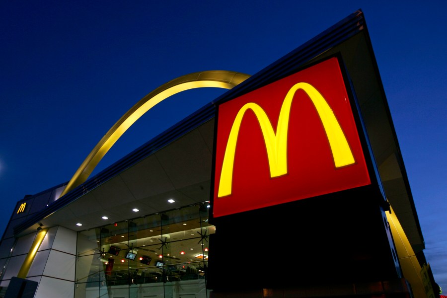 The McDonald's restaurant logo and golden arch.