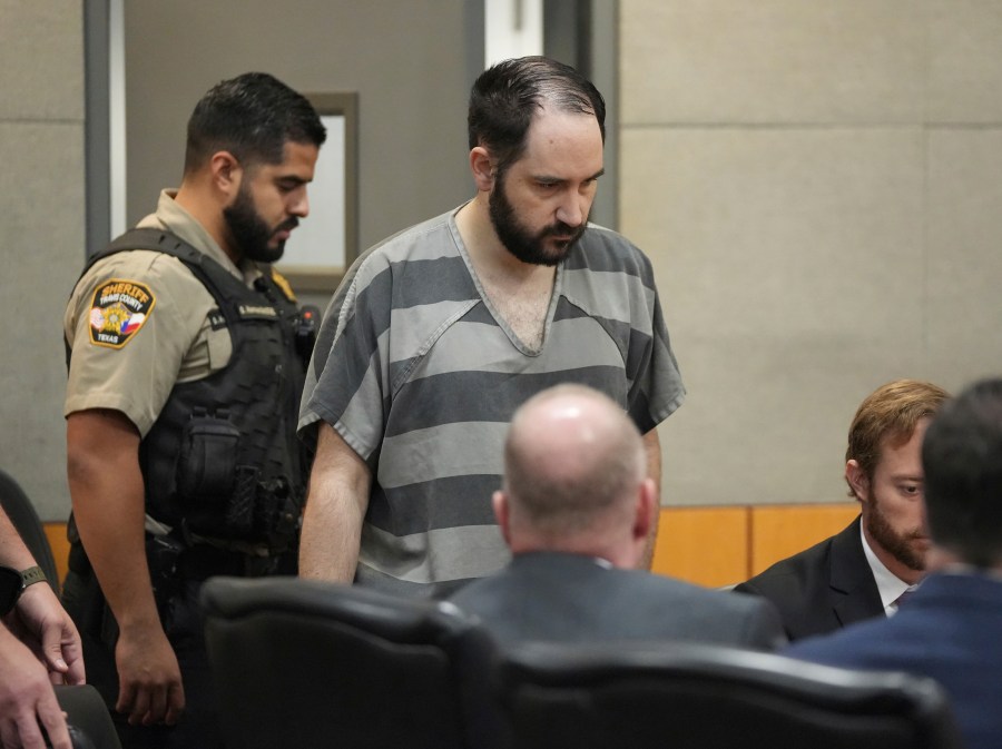 FILE - Daniel Perry enters the courtroom at the Blackwell-Thurman Criminal Justice Center, May 10, 2023, in Austin, Texas. The Texas Board of Pardons and Paroles on Thursday, May 16, 2024, recommended a full pardon for Perry, a former U.S. Army sergeant convicted of murder for fatally shooting an armed demonstrator in 2020 during nationwide protests against police violence and racial injustice. (Jay Janner/Austin American-Statesman via AP, Pool, File)