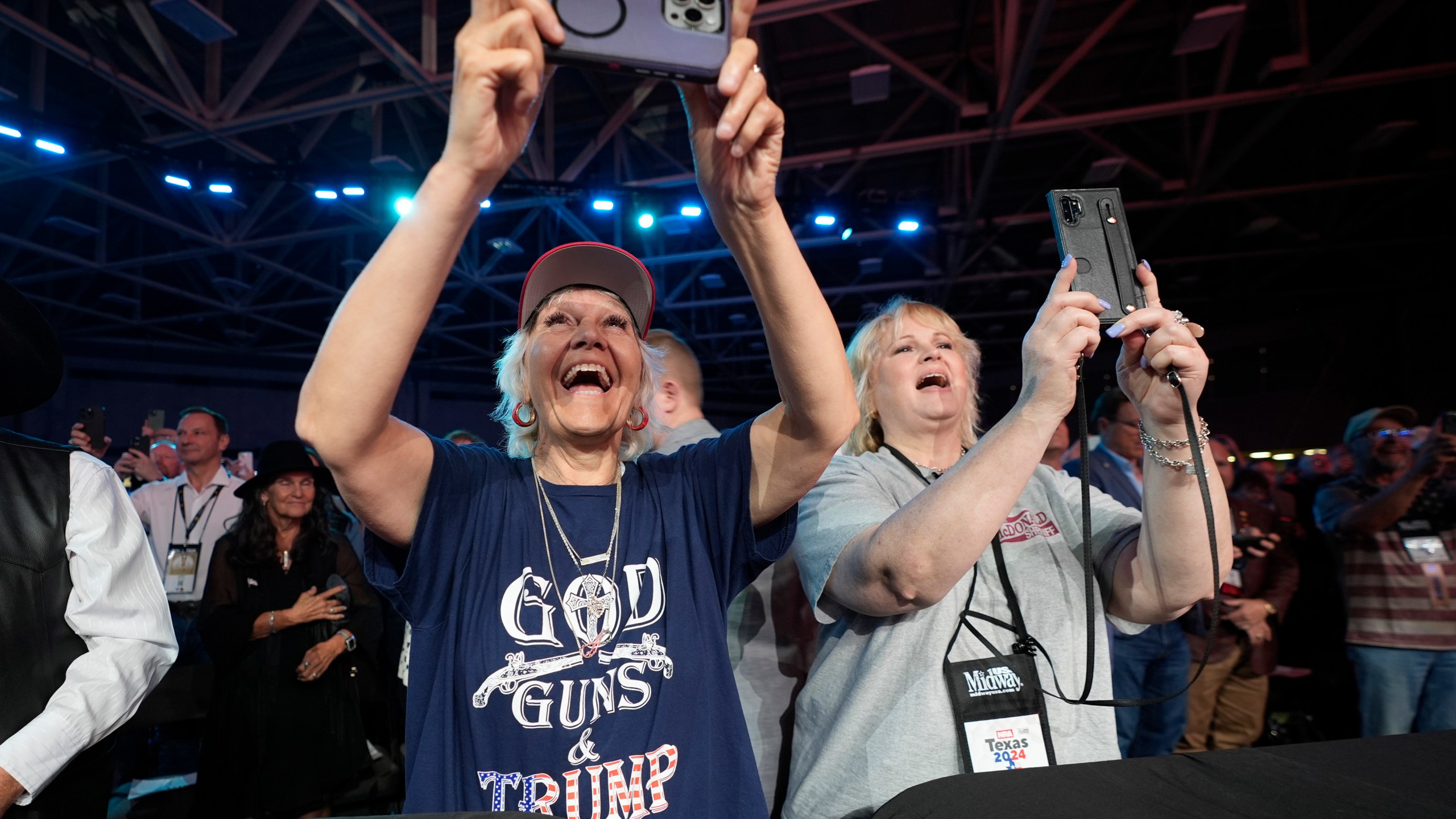 Supporters cheer for former President Donald Trump before he speaks at the National Rifle Association Convention, Saturday, May 18, 2024, in Dallas. (AP Photo/LM Otero)