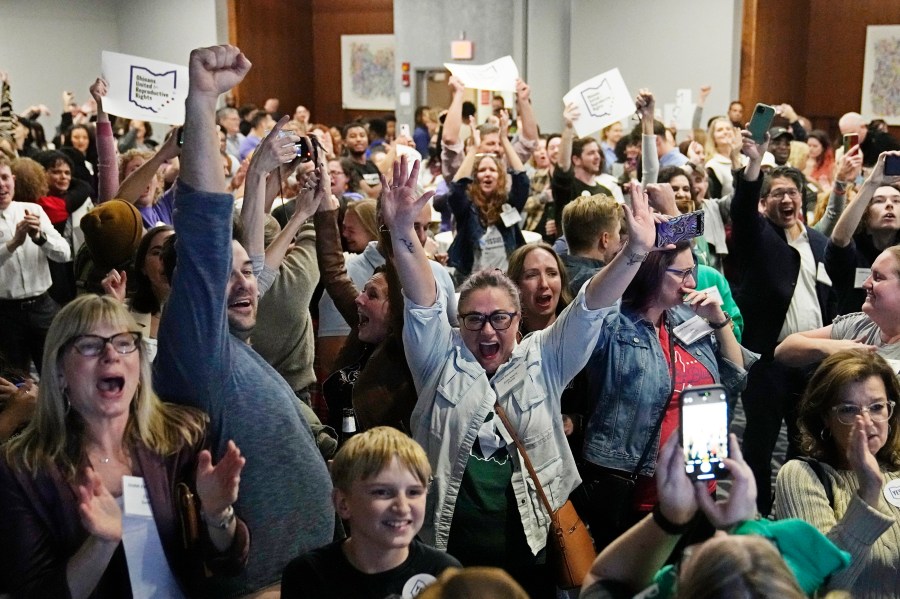 FILE - Issue 1 supporters cheer as they watch election results come in, Tuesday, Nov. 7, 2023, in Columbus Ohio. (AP Photo/Sue Ogrocki, file)