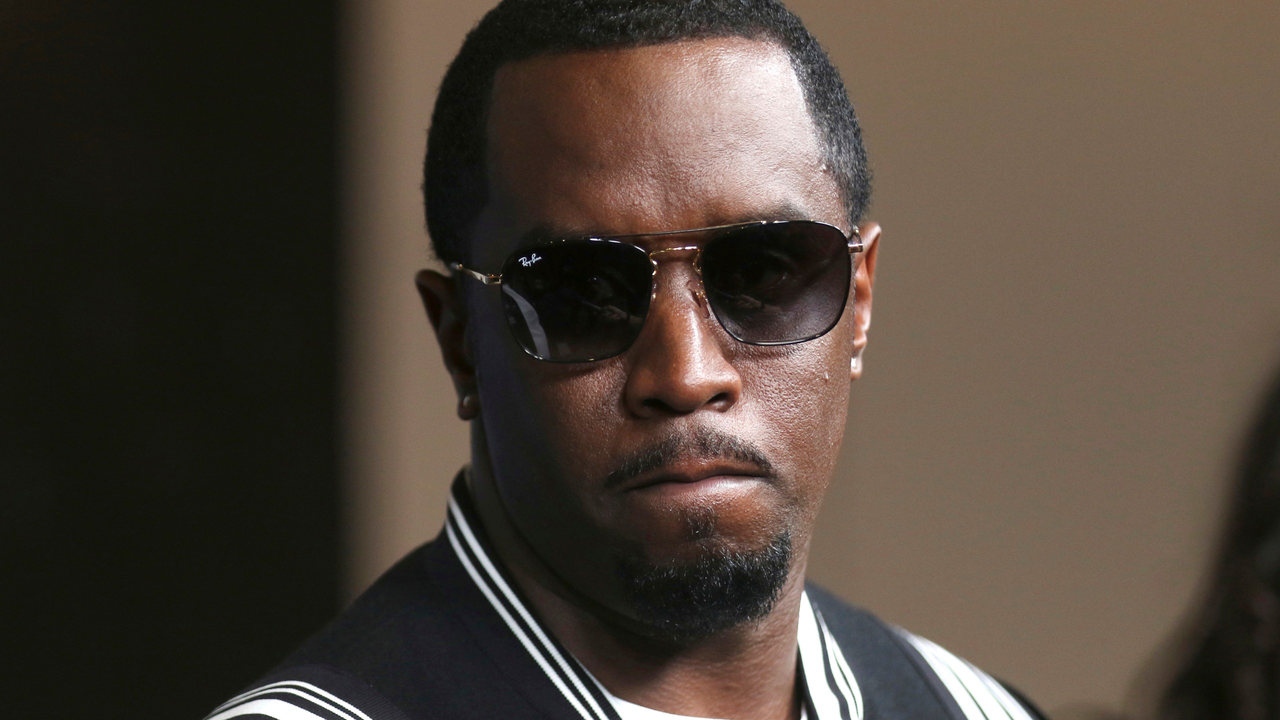 Sean "Diddy" Combs arrives at a movie premiere.