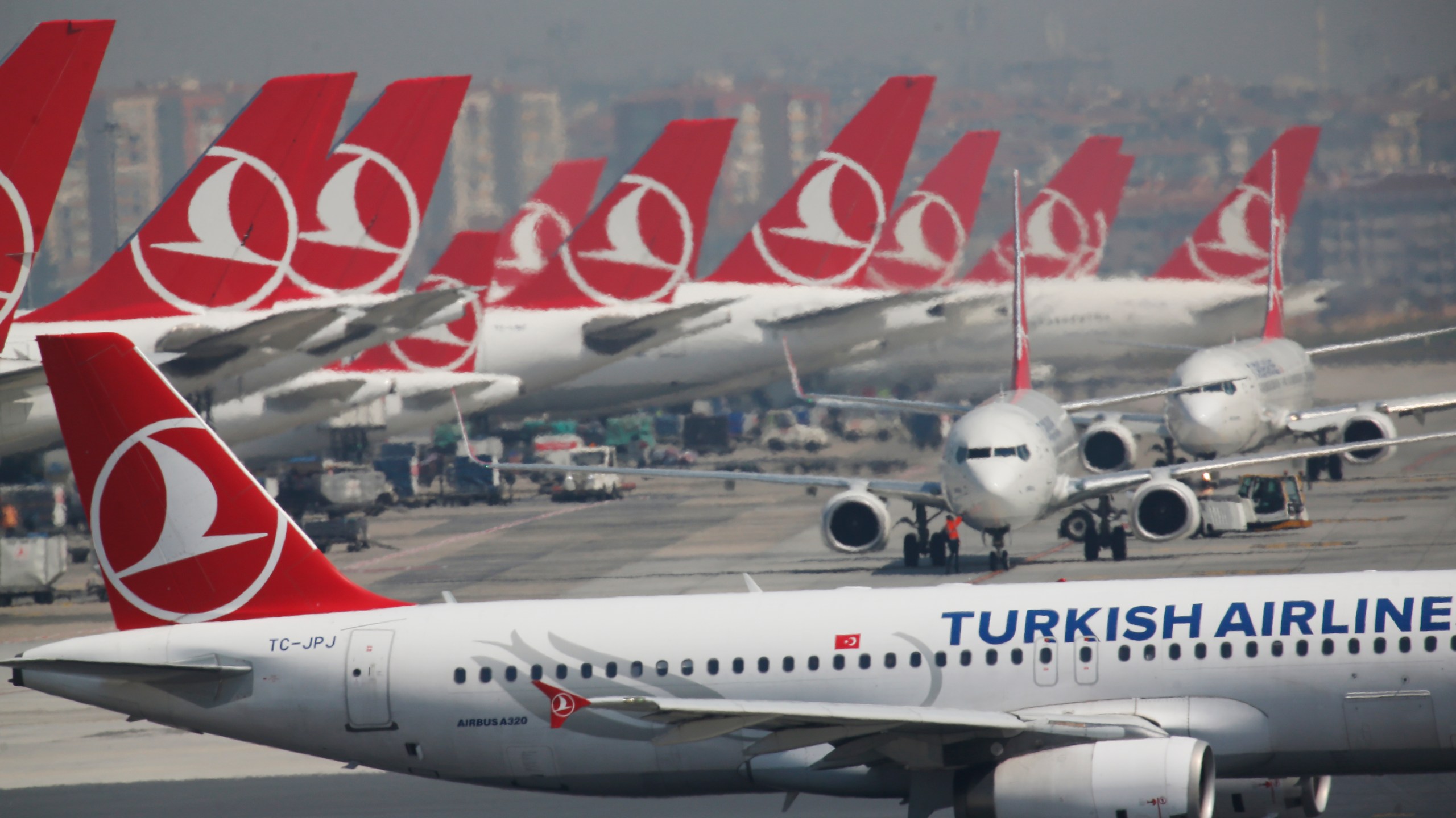 Turkish Airlines airplanes are parked at Ataturk International Airport, in Istanbul.