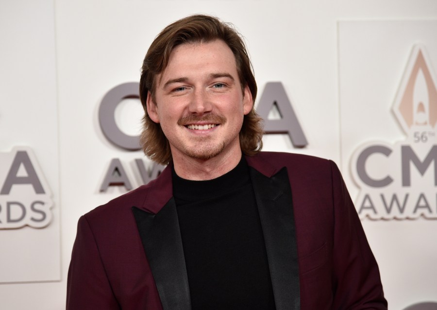 FILE - Morgan Wallen arrives at the 56th annual CMA Awards, Nov. 9, 2022, in Nashville, Tenn. On Tuesday, May 21, 2024, Nashville councilmembers rejected plans for a glowing sign at Wallen's new bar along the city's neon-lit strip of honky tonks, citing his use of a racial slur publicized in 2021 and his recent criminal charges of throwing a chair off a rooftop and nearly hitting two police officers. (Photo by Evan Agostini/Invision/AP, File)