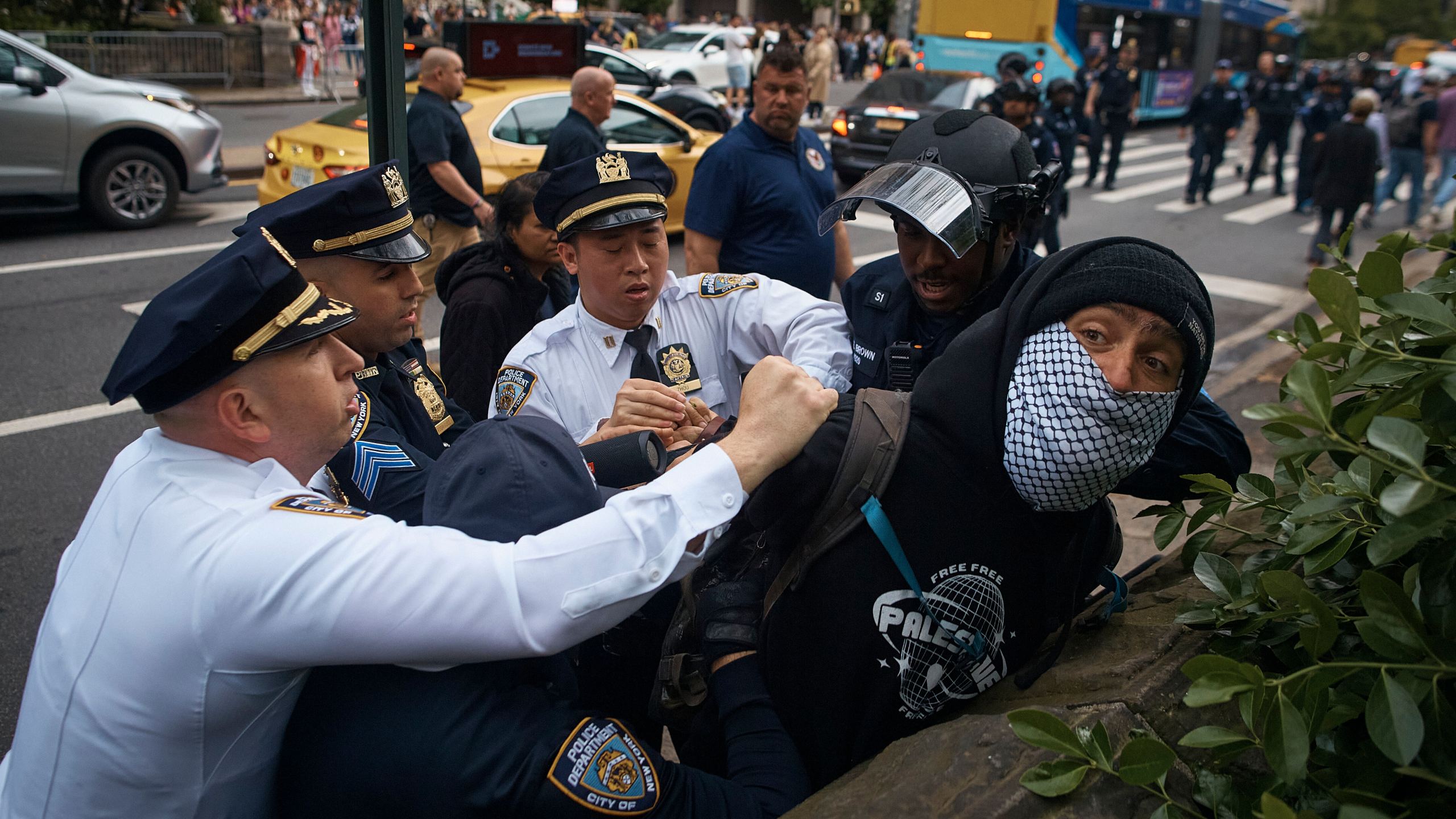 FILE - Police arrest a pro-Palestinian protester near the Metropolitan Museum of Art, where the Met Gala takes place, May 6, 2024, in New York. Some civil liberties attorneys are questioning New York City Mayor Eric Adams' commitment to overhauling how police respond to protests in the wake of the NYPD’s aggressive response to a pro-Palestinian demonstration on Saturday, May 18, where officers were filmed pummeling a man on the ground and holding another protester by the throat. (AP Photo/Andres Kudacki, File)