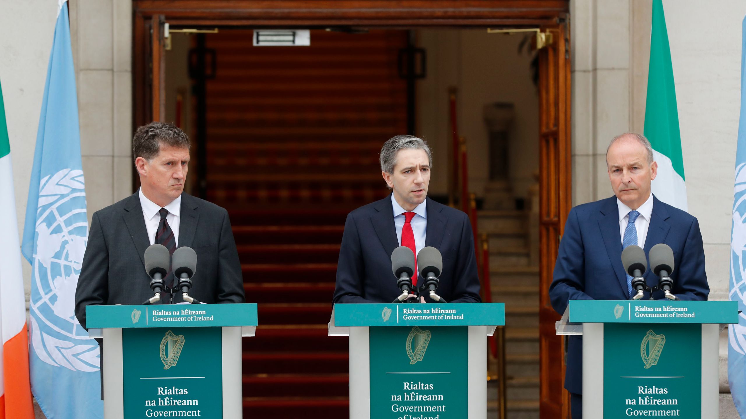 The three Irish Government leaders from left, Minister Eamon Ryan, Taoiseach Simon Harris and Tanaiste Micheal Martin speak to the media during a press conference outside the Government Buildings, in Dublin, Ireland, Wednesday May 22, 2024. Ireland and Spain have recognized a Palestinian state. Irish Prime Minister Simon Harris said Wednesday it was a move coordinated with Spain and Norway, “an historic and important day for Ireland and for Palestine.” He said the move was intended to help move the Israeli-Palestinian conflict to resolution through a two-state solution. (Damien Storan/PA via AP)