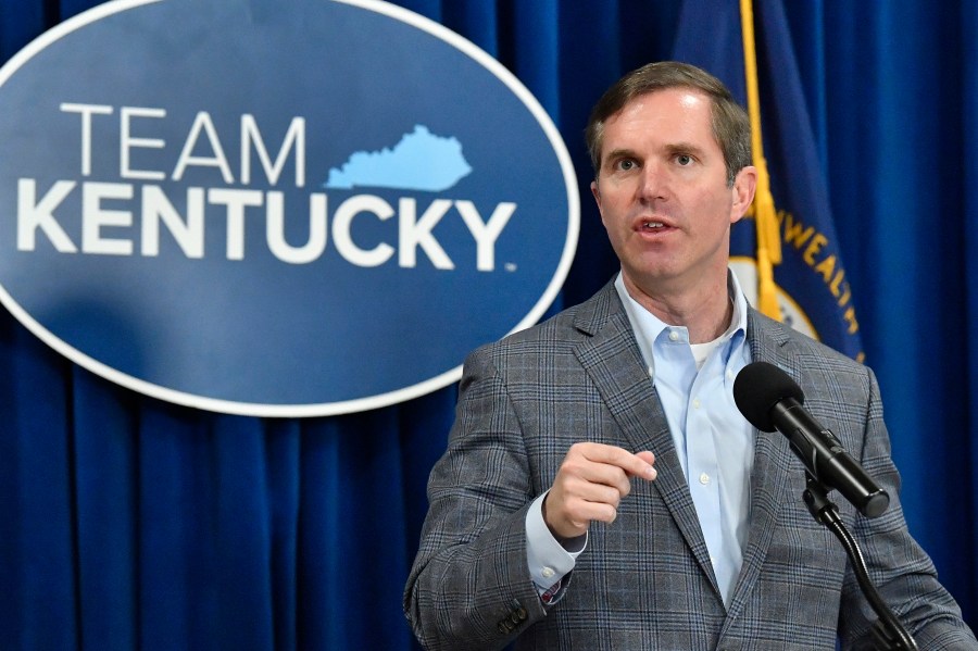 FILE - Kentucky Gov, Andy Beshear speaks in the Rotunda of the Kentucky State Capitol in Frankfort, Ky., Tuesday, March 26, 2024. With a stroke of his pen, Kentucky Gov. Andy Beshear took action Thursday to designate Juneteenth as a holiday for state executive branch workers and expand protections in state hiring and employment by banning discrimination based on hairstyles. (AP Photo/Timothy D. Easley, file)