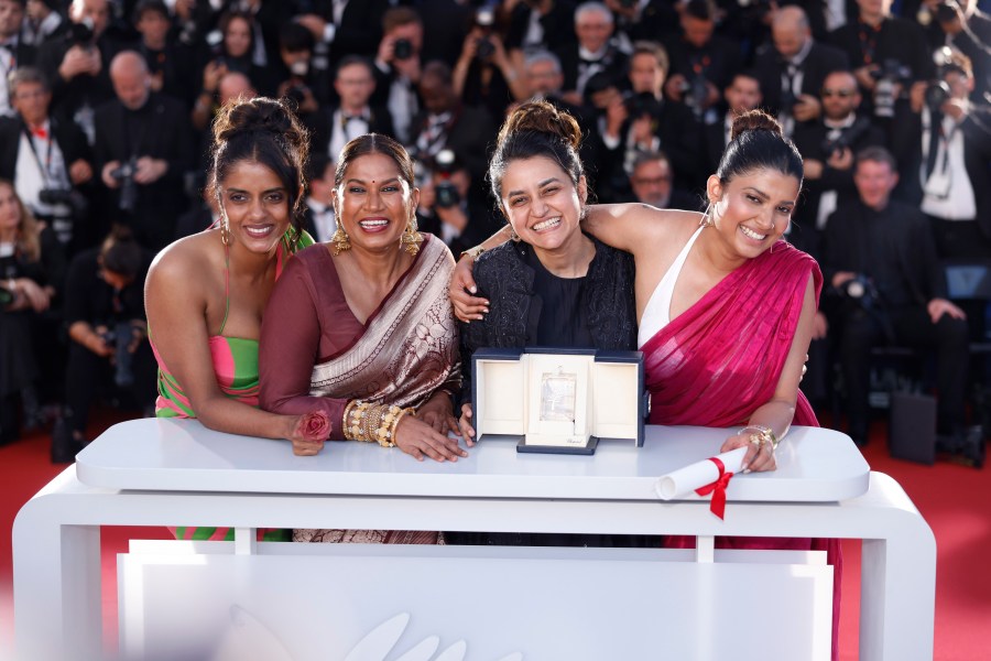 Payal Kapadia, second from right, winner of the grand prize for 'All We Imagine as Light,' poses with Kani Kusruti, from left, Chhaya Kadam, and Divya Prabha during the photo call following the awards ceremony at the 77th international film festival, Cannes, southern France, Saturday, May 25, 2024. (Photo by Vianney Le Caer/Invision/AP)