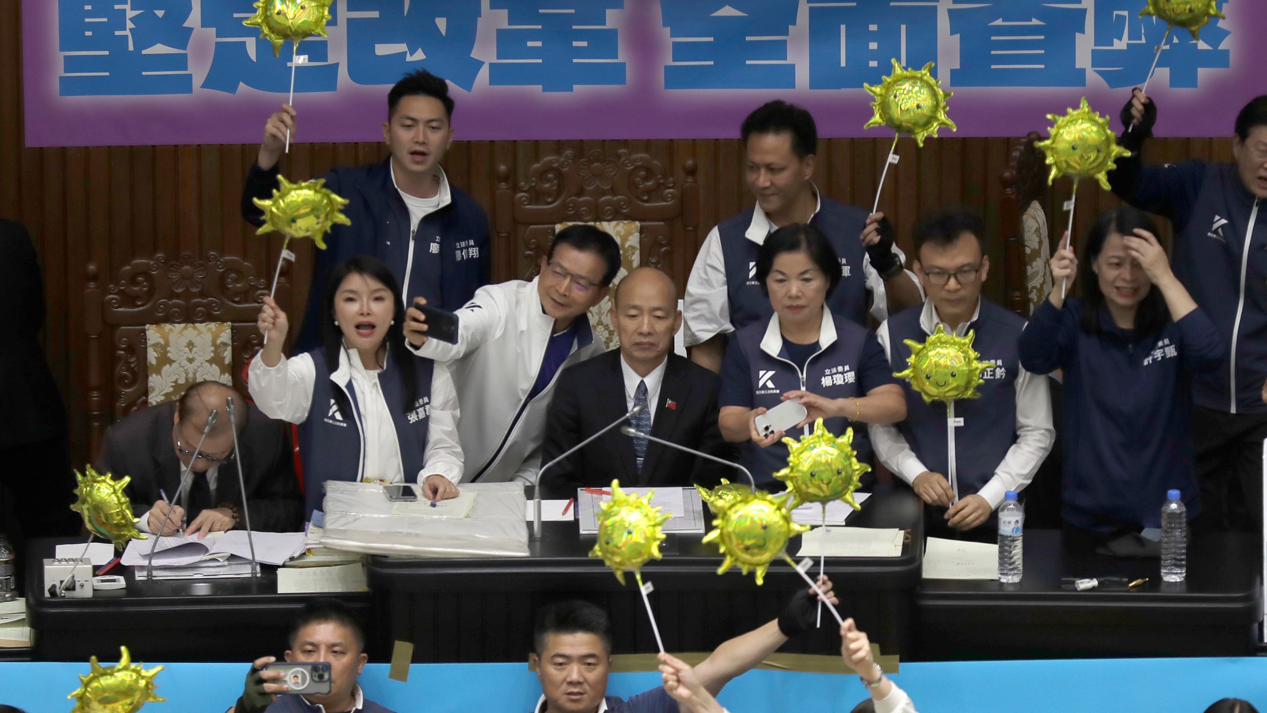 Supporters for both ruling and opposition parties demonstrate at the legislative chamber building in Taipei, Taiwan, Tuesday, May 28, 2024. (AP Photo/Chiang Ying-ying)