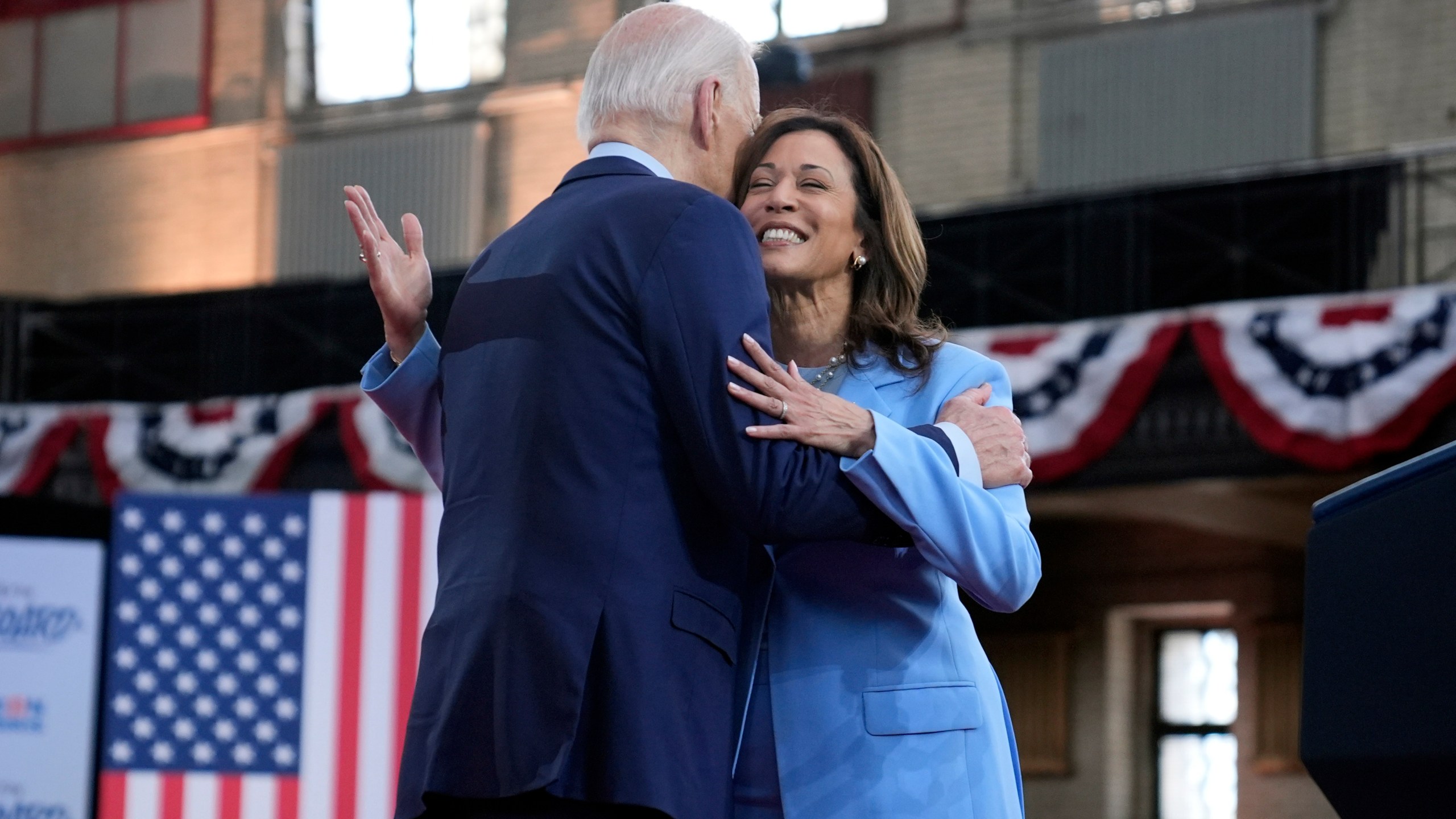 President Joe Biden hugs Vice President Kamala Harris during a campaign event at Girard College, Wednesday, May 29, 2024, in Philadelphia. (AP Photo/Evan Vucci)