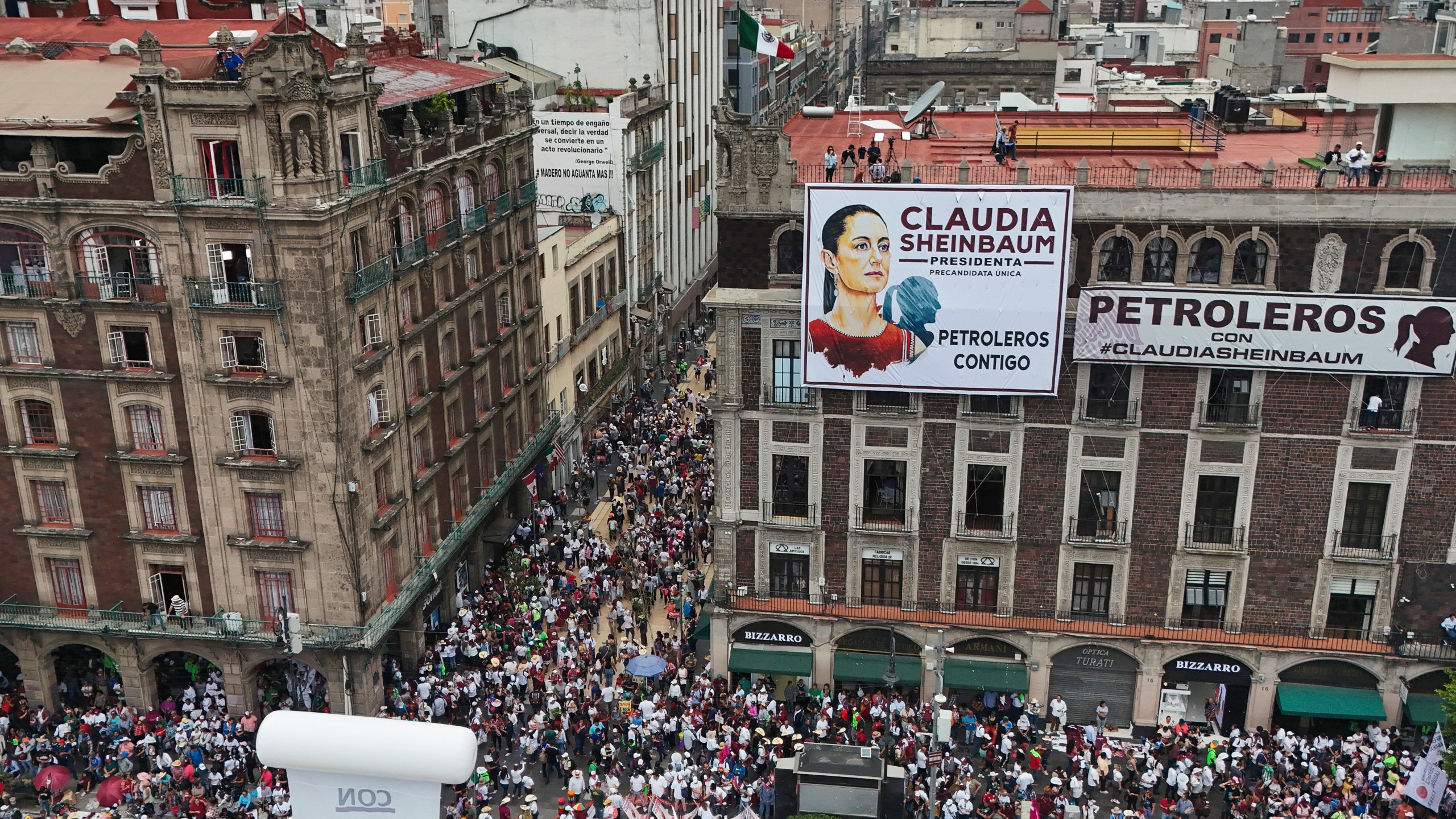 Supporters of ruling party presidential candidate Claudia Sheinbaum arrive at the Zocalo for her closing campaign rally in Mexico City, Wednesday, May 29, 2024, on the last day of campaigning ahead of the June 2 general election. (AP Photo/Matias Delacroix)