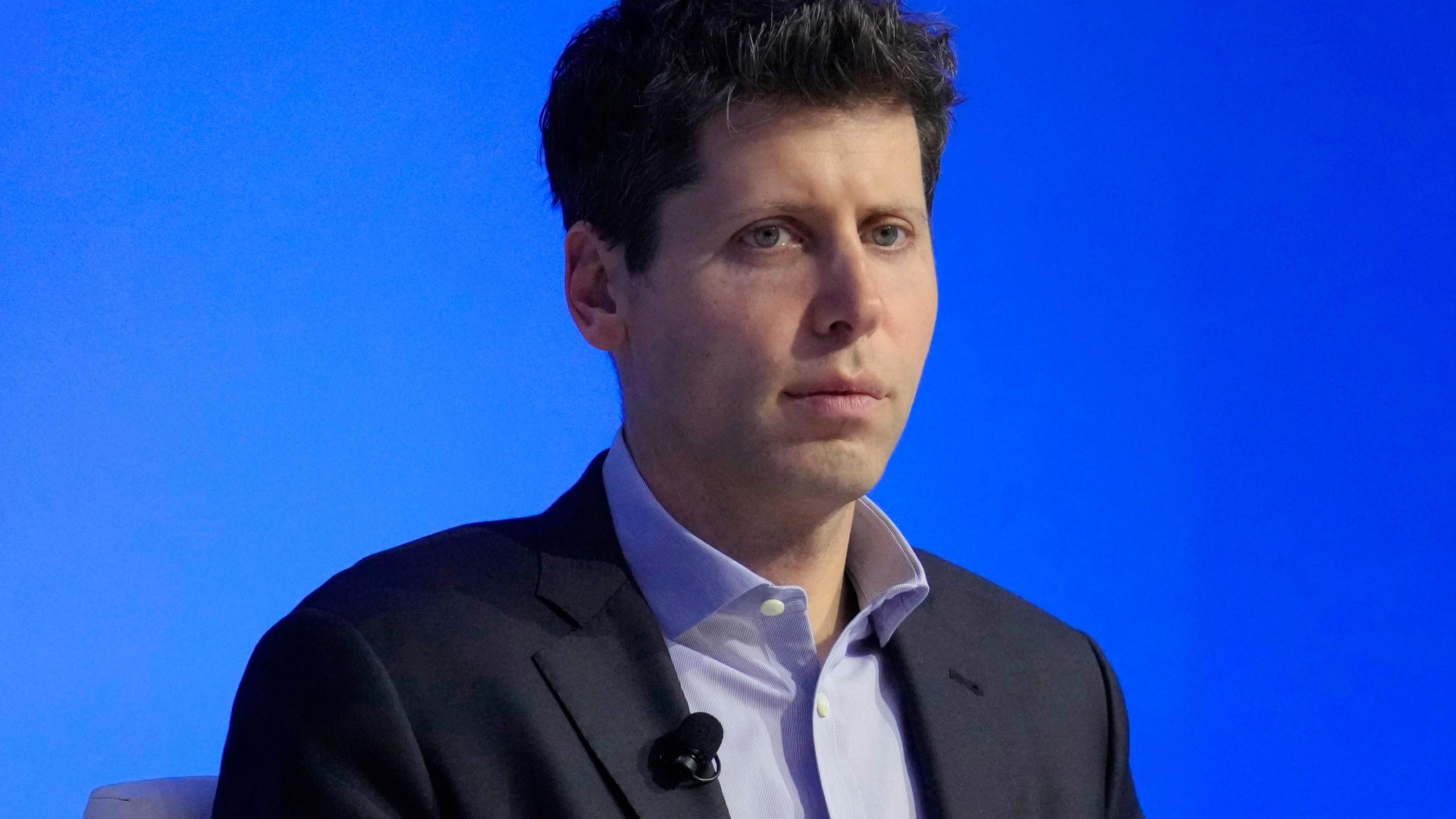 FILE — OpenAI CEO Sam Altman participates in a discussion during the Asia-Pacific Economic Cooperation CEO Summit, Nov. 16, 2023, in San Francisco. The U.N. telecommunications agency has kicked off its annual AI for Good conference in hopes of guiding business, consumers and governments on ways to tap the promise of the new technology but avoid its potential perils. OpenAI chief Sam Altman whose company created ChatGPT is among the tech leaders set to join the Geneva event Thursday, May 30, 2024. (AP Photo/Eric Risberg, File)