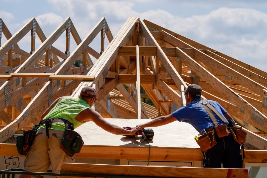 File - Carpenters work on a home on Sept. 19, 2023, in Marshall, N.C. On Thursday, May 30, 2024, Freddie Mac reports on this week's average U.S. mortgage rates. (AP Photo/Chris Carlson, File)