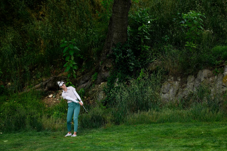 Nelly Korda hits off the rough on the fourth hole during the first round of the U.S. Women's Open golf tournament at Lancaster Country Club, Thursday, May 30, 2024, in Lancaster, Pa. (AP Photo/Matt Rourke)