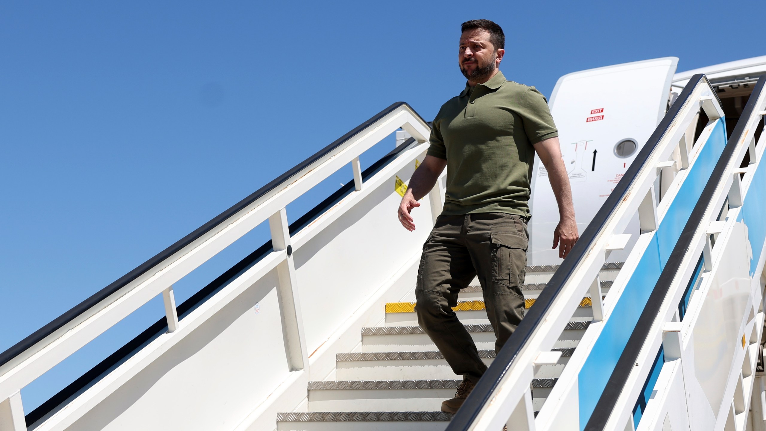 Ukrainian President Volodymyr Zelenskyy disembarks from his airplane after landing at the military airport in Lisbon, for a official visit to Portugal, Tuesday, May 28, 2024. (Tiago Petinga, Pool Photo via AP)