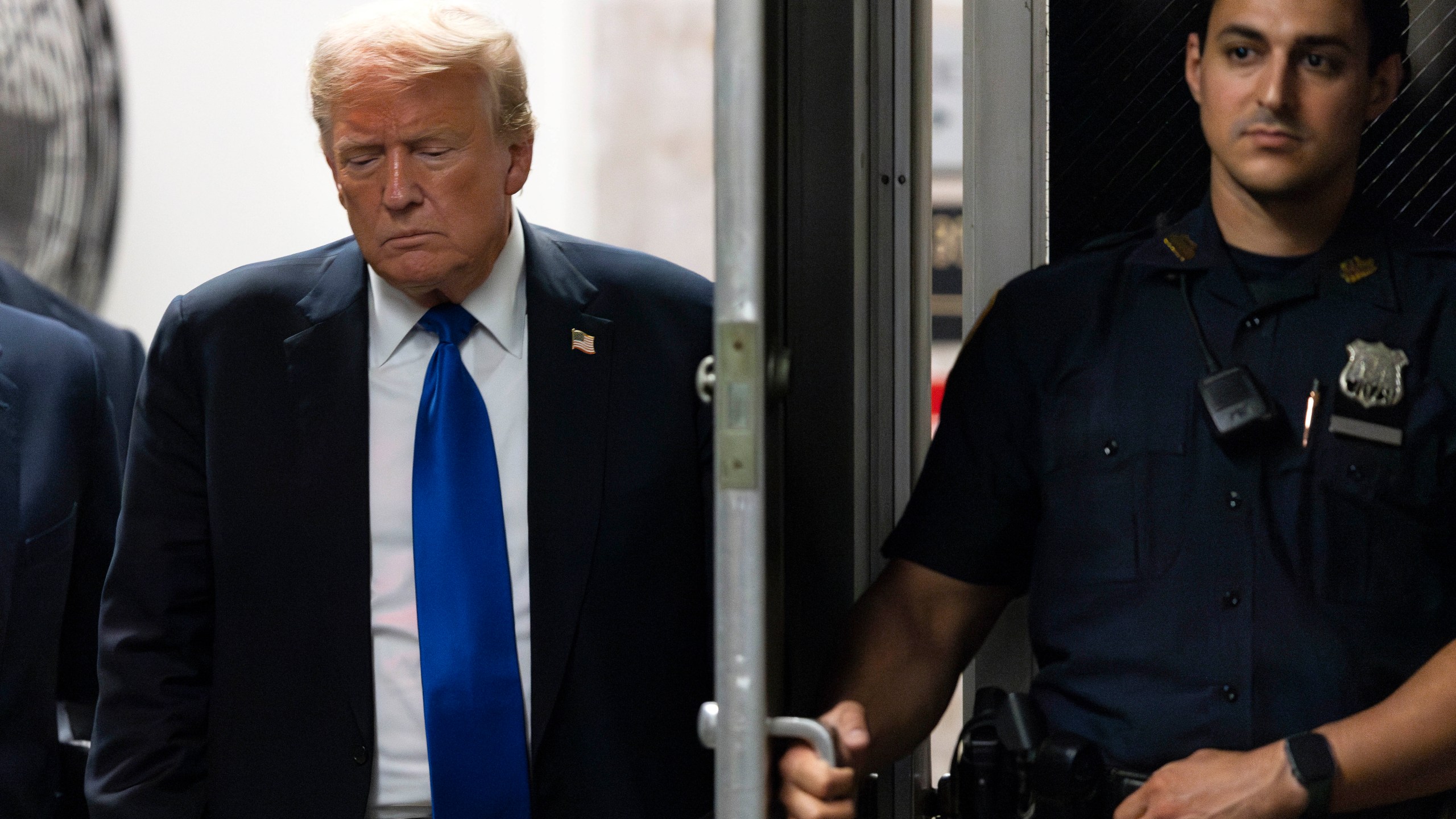 Former President Donald Trump returns to the courthouse moments before hearing that the jury had a verdict in his criminal trial at Manhattan Criminal Court, Thursday, May 30, 2024, in New York. (Justin Lane/Pool Photo via AP)