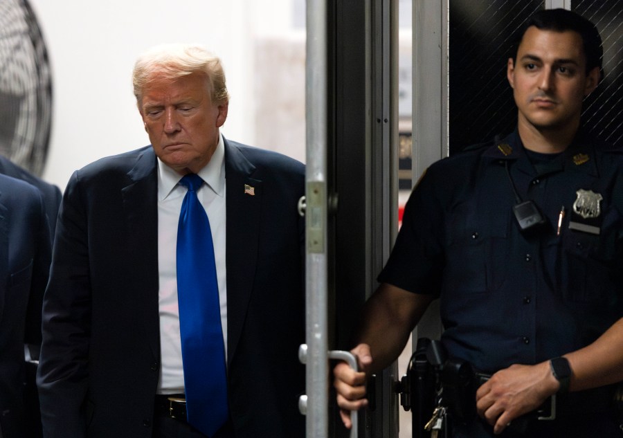 Former President Donald Trump returns to the courthouse moments before hearing that the jury had a verdict in his criminal trial at Manhattan Criminal Court, Thursday, May 30, 2024, in New York. (Justin Lane/Pool Photo via AP)